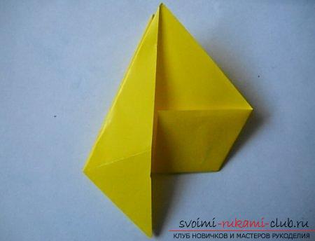A three-dimensional figure of a dog in origami technique. Photo # 2