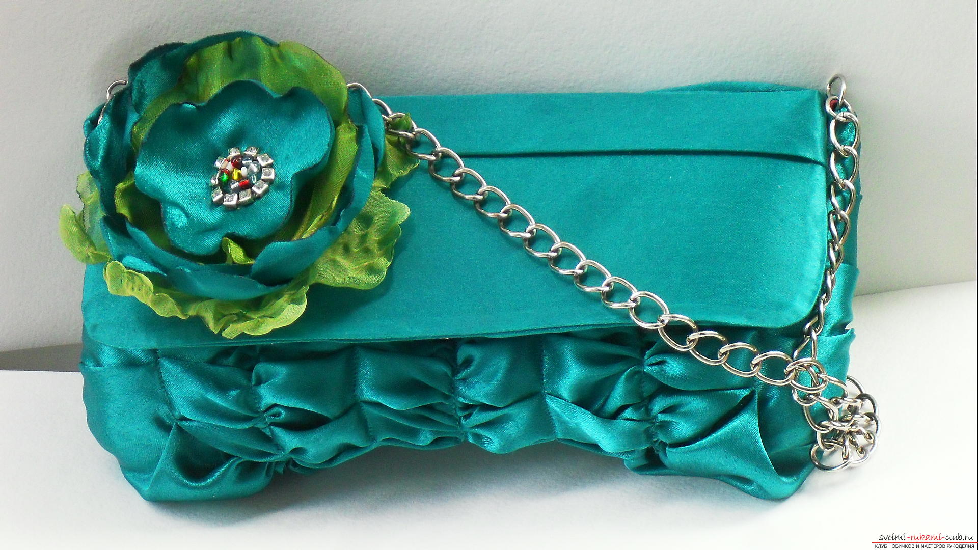 The clutch is a remake of satin. Photo №1