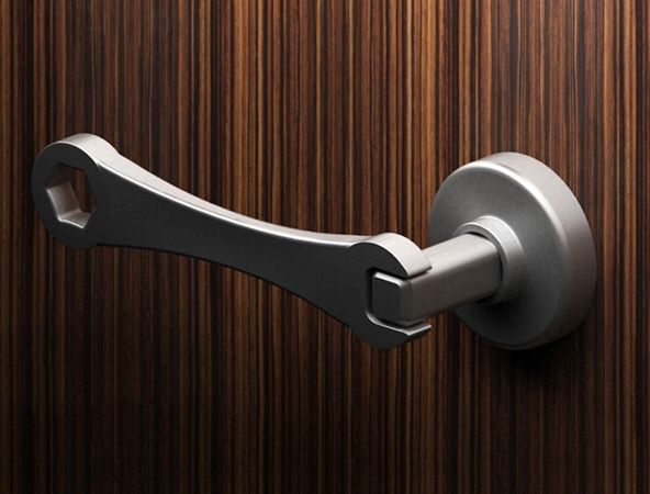 unusual door handle in the form of a spanner