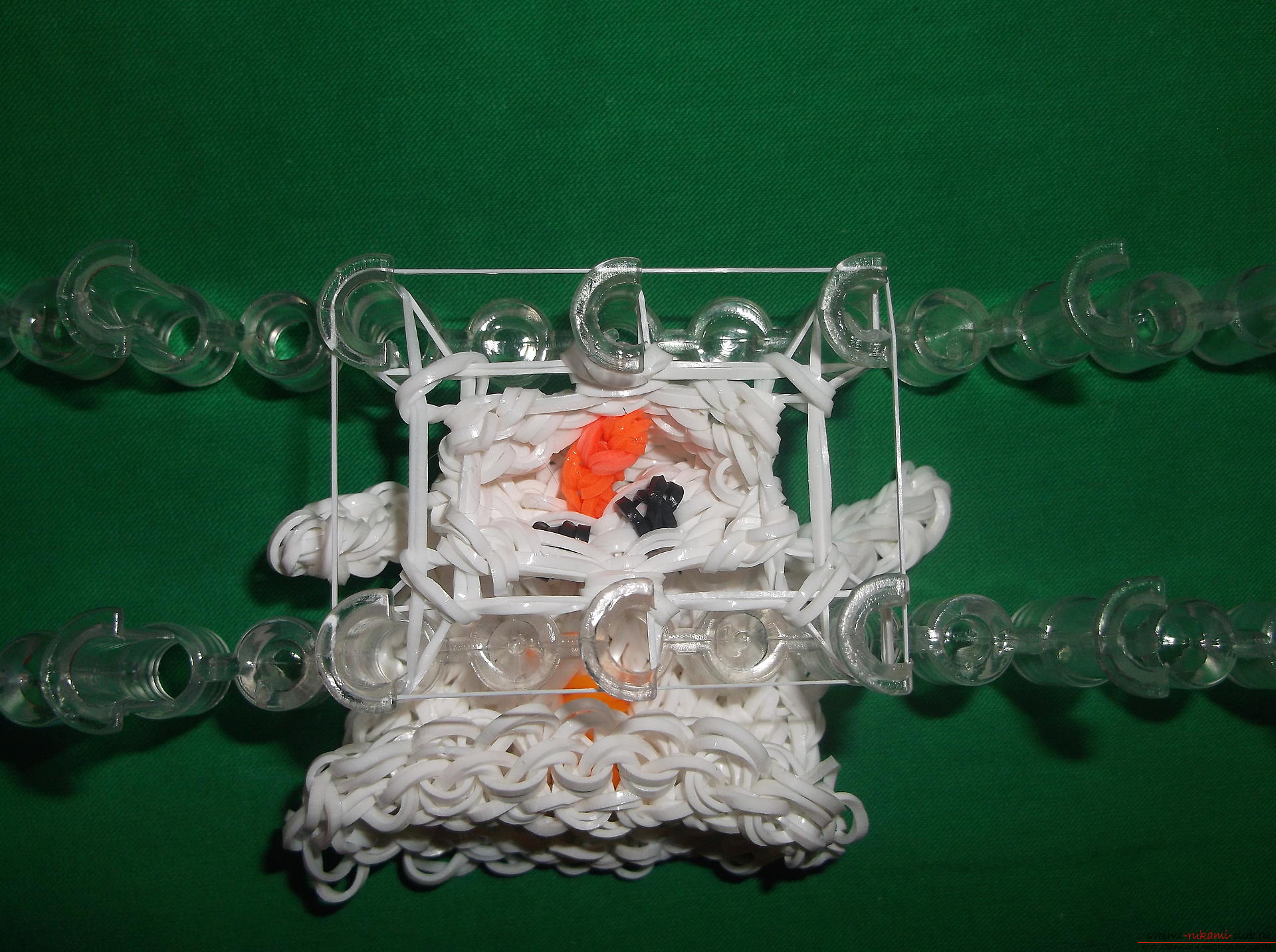 A photo for a lesson on weaving of snowman's rubber bands for the New Year holidays. Photo №13