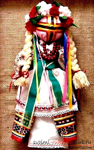 Een pop-motanka, gemaakt door eigen handen. Foto №1