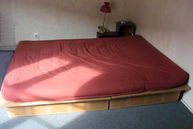 double bed with cardboard