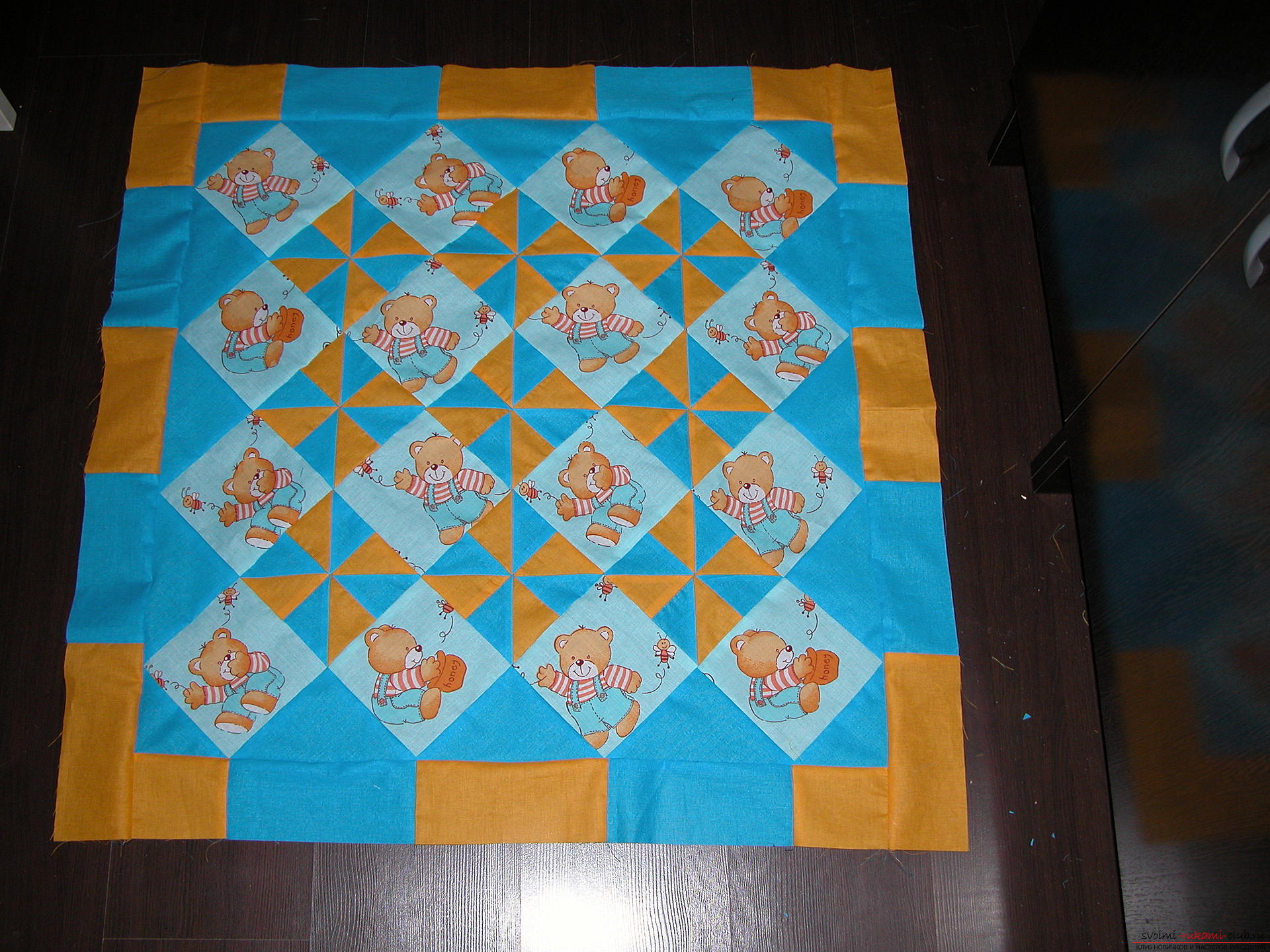 A detailed master class on sewing a children's quilt. Photo Number 14