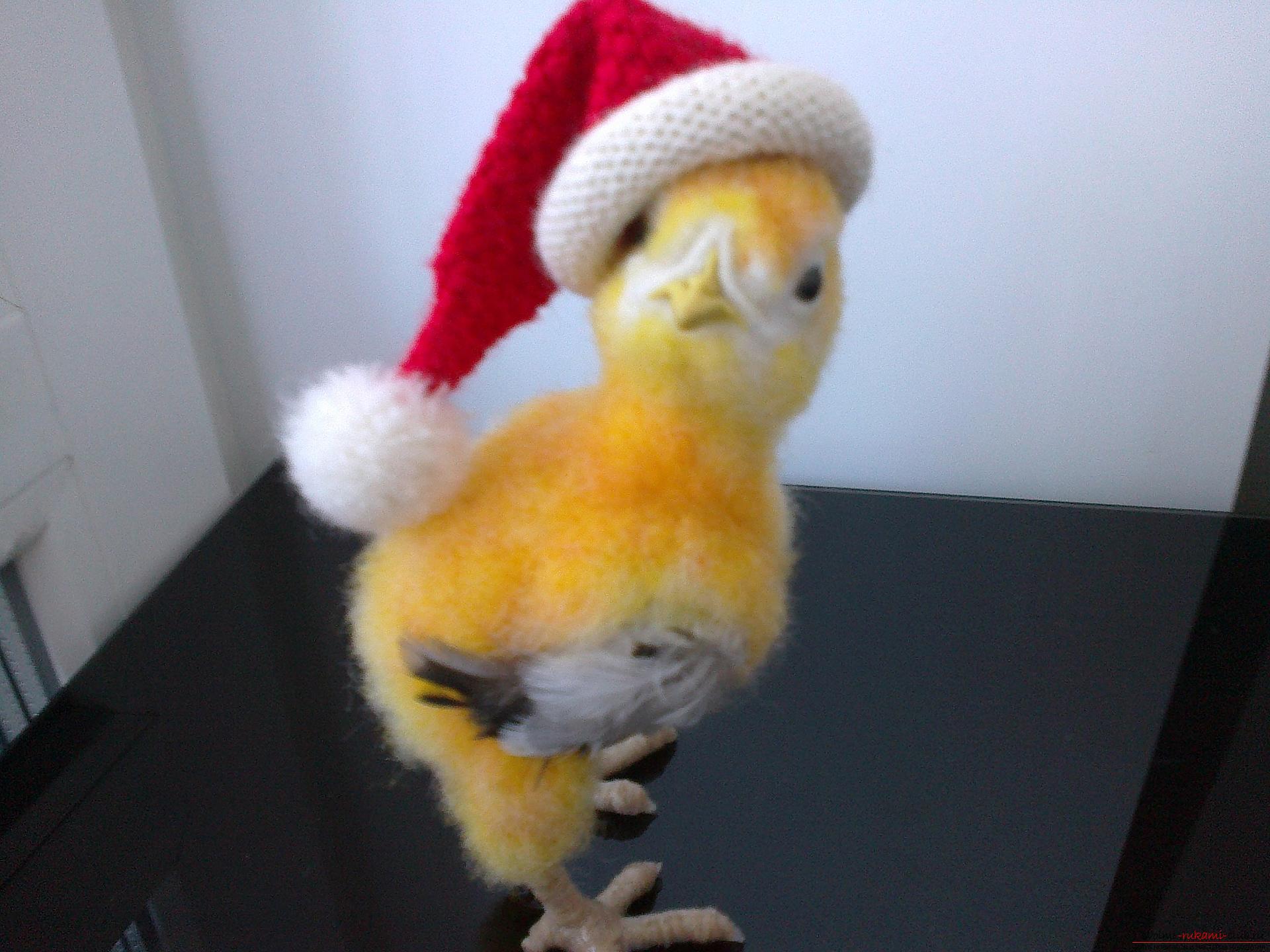 Description of the toy in the form of a chicken, made in the technique of dry felting. Photo №8