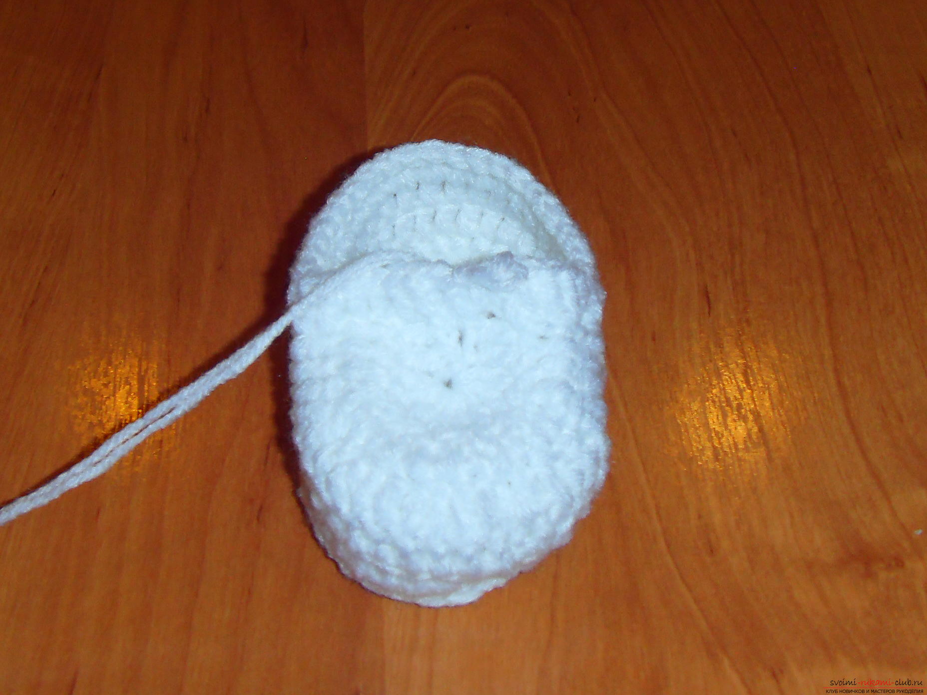 A master class with a detailed description will teach how to crochet booties for newborns. Picture №10