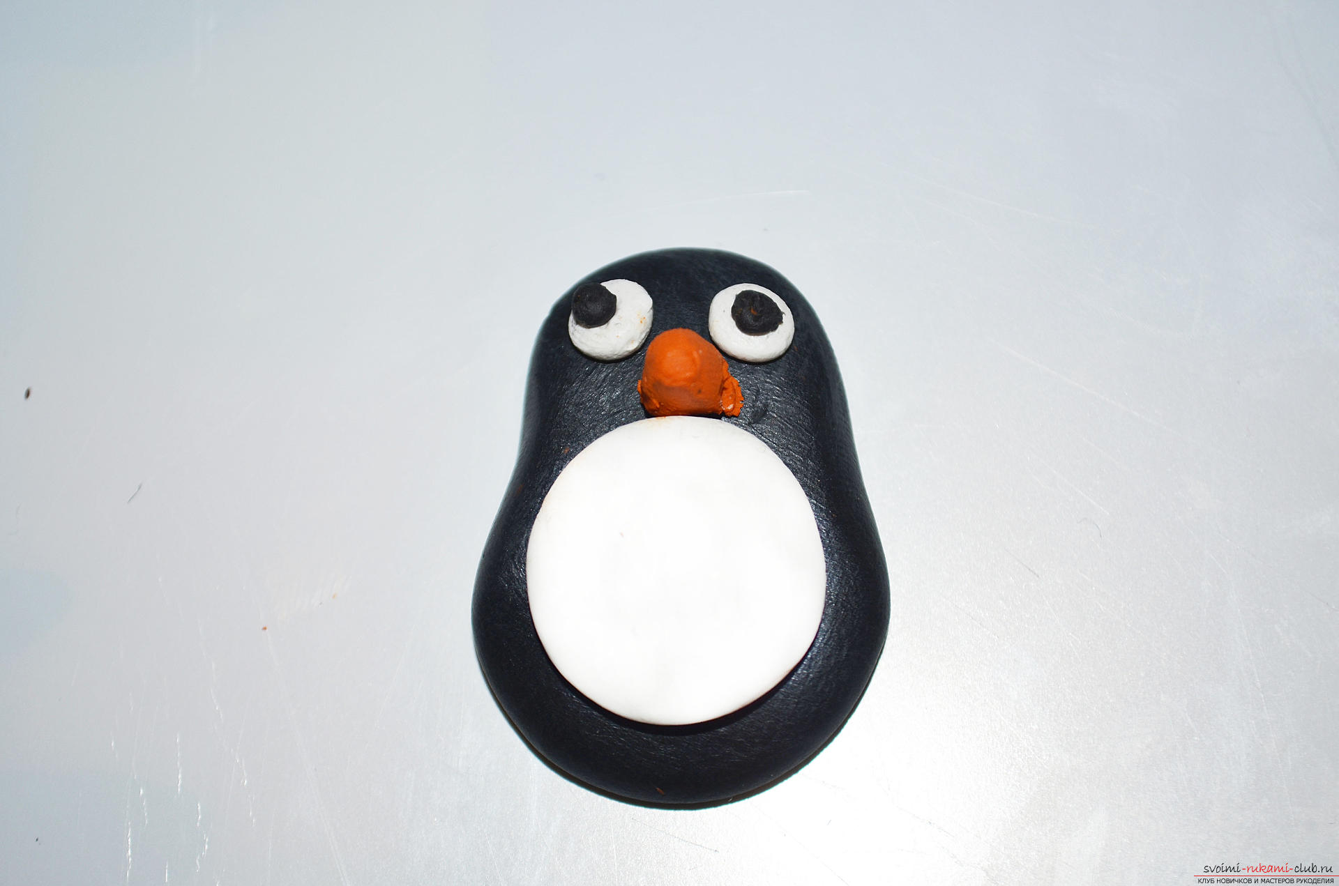 Photo to the lesson modeling from polymer clay penguin. Photo №8