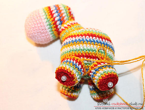 A lesson on knitting an amigurumi crochet with description and photo. Photo number 15