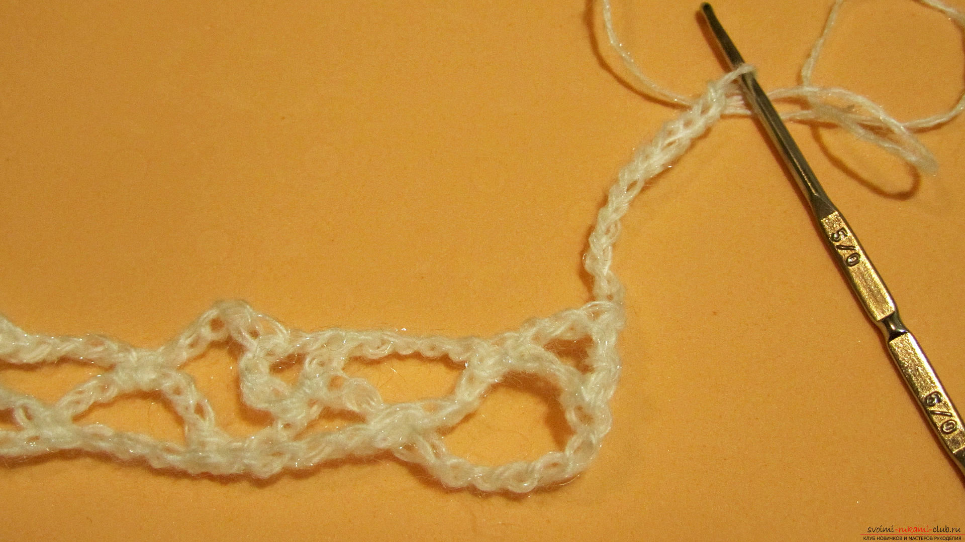 The master class is dedicated to knitting a beautiful stitch with a crochet. Photo number 15