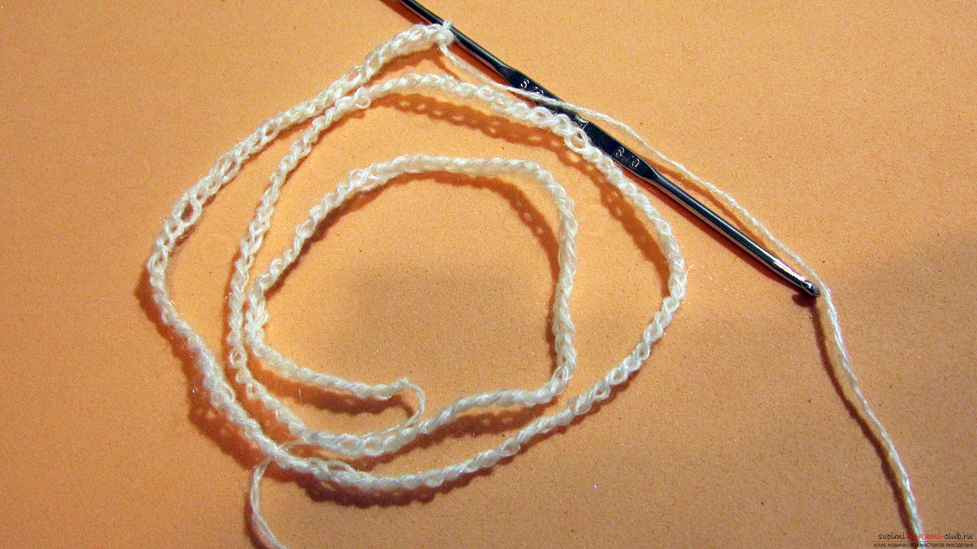 The master class is dedicated to knitting a beautiful stitch with a crochet. Photo # 2