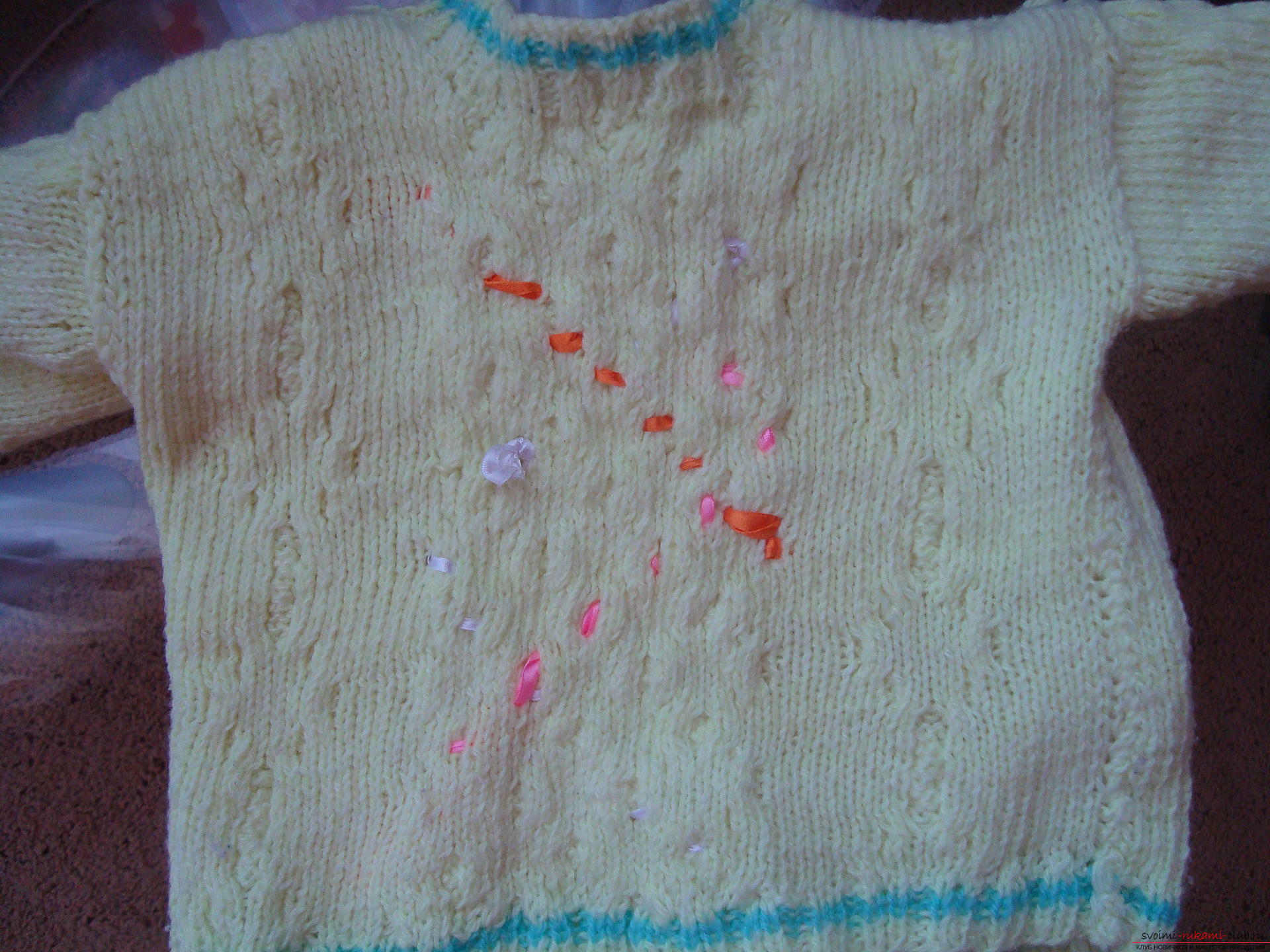 Step-by-step photo-instruction for knitting a baby sweater on knitting needles. Photo Number 11