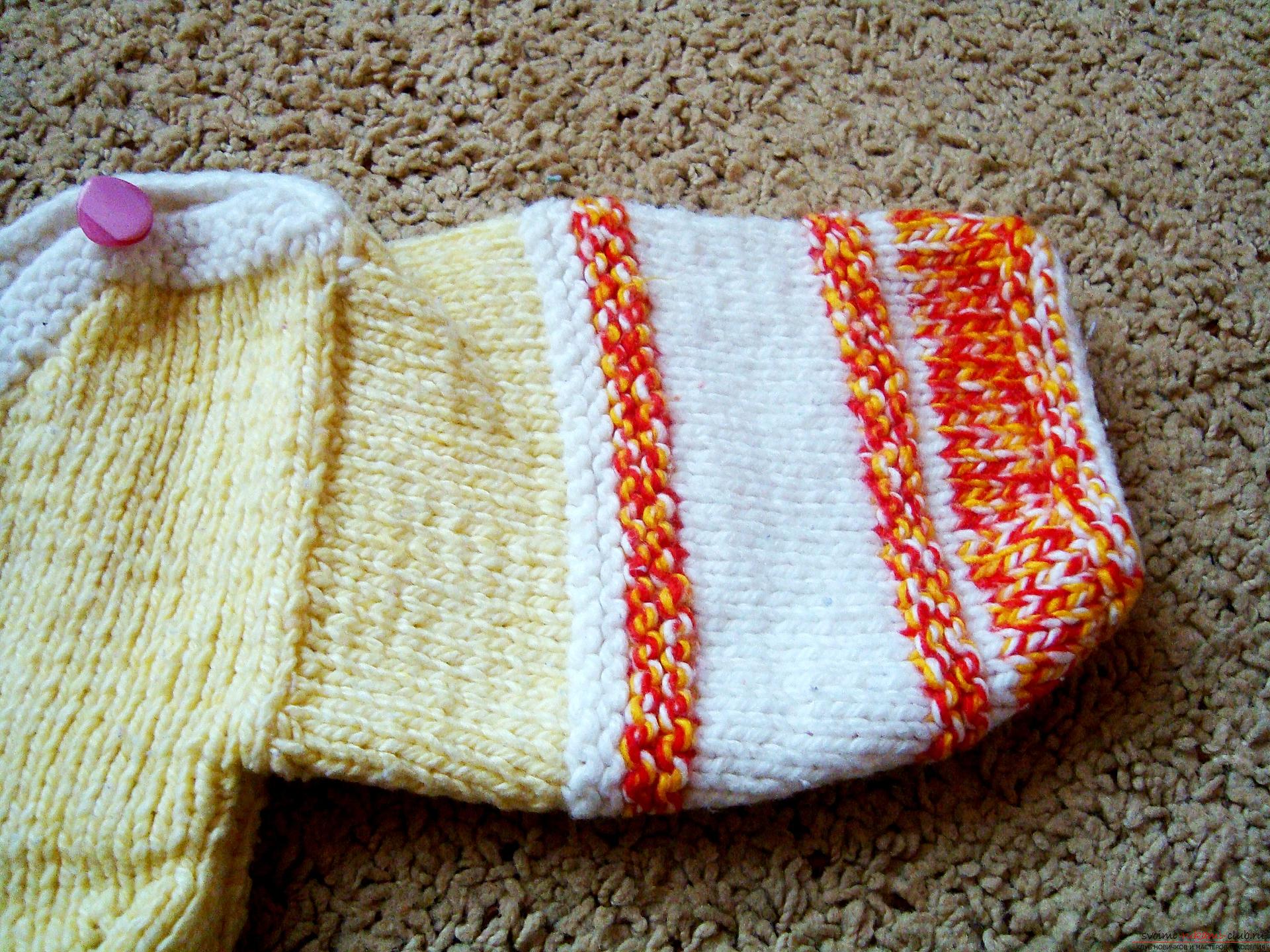 A master class with photo on knitting with needles will help to create a children's sweater that will warm in any weather. The use of bright yarn will make the thing unique and beautiful .. Photo # 6