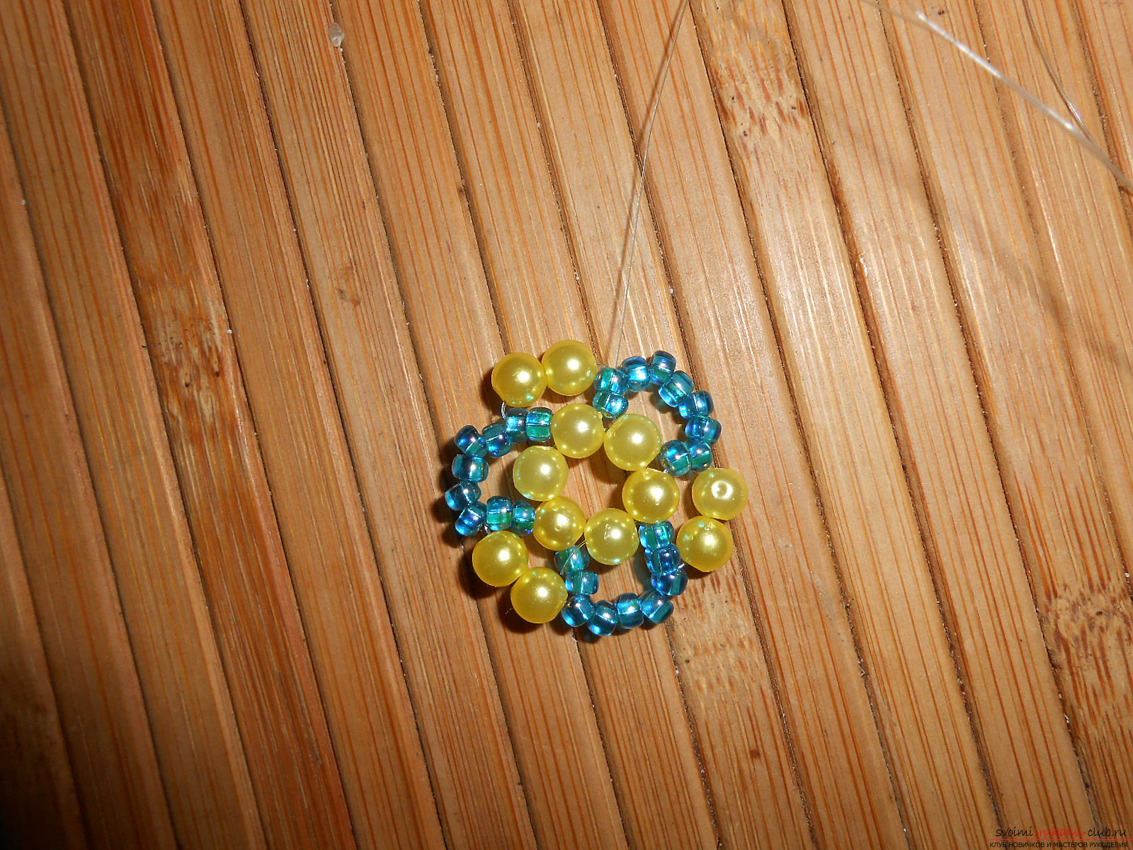 This master class of weaving from beads will tell you how to weave the earrings yourself. Photo # 9