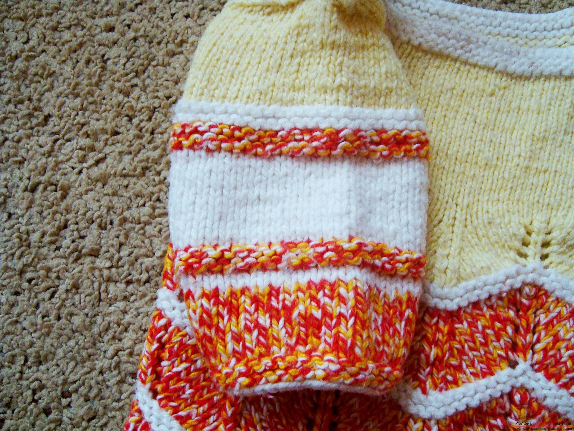 A master class with photo on knitting with needles will help to create a children's sweater that will warm in any weather. The use of bright yarn will make the thing unique and beautiful .. Photo # 7