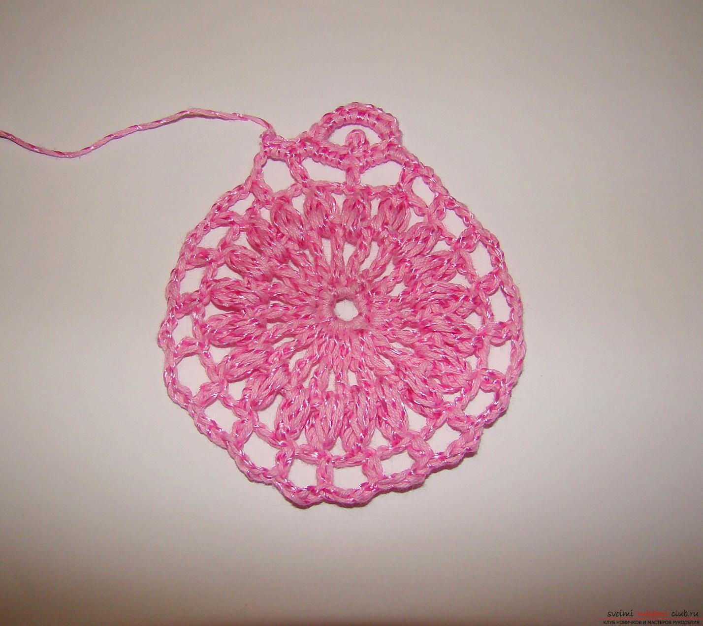 A master class of knitting with a diagram and a photo will teach you how to crochet an openwork flower with a crochet. Photo №8