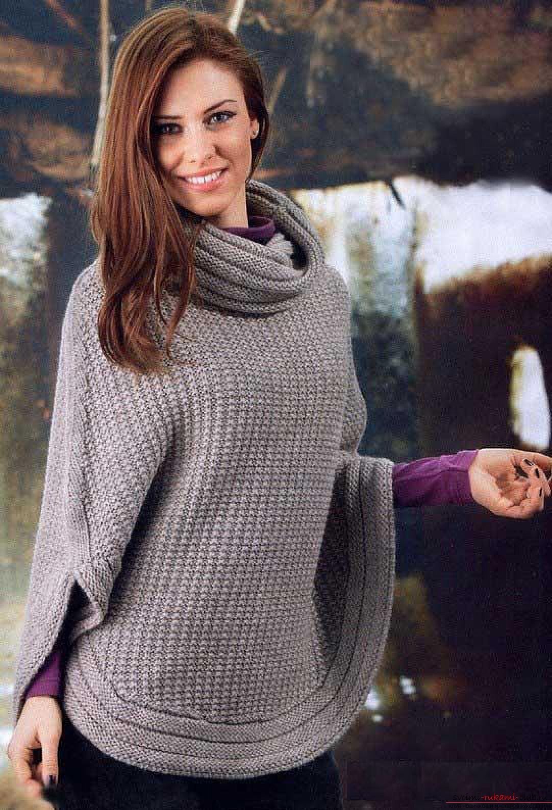 knitted knitting needles on a wide poncho. Photo # 2