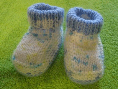 Beautiful booties for knitting with two spokes. Photo №8