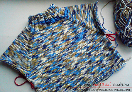 A seamless raglan-sweater with knitting needles. A description and photos of knitting a winter warm sweater for a child. Photo # 2