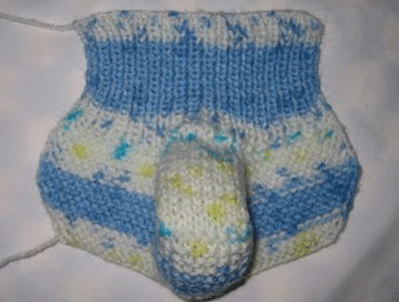 Beautiful booties for knitting with two spokes. Photo №7