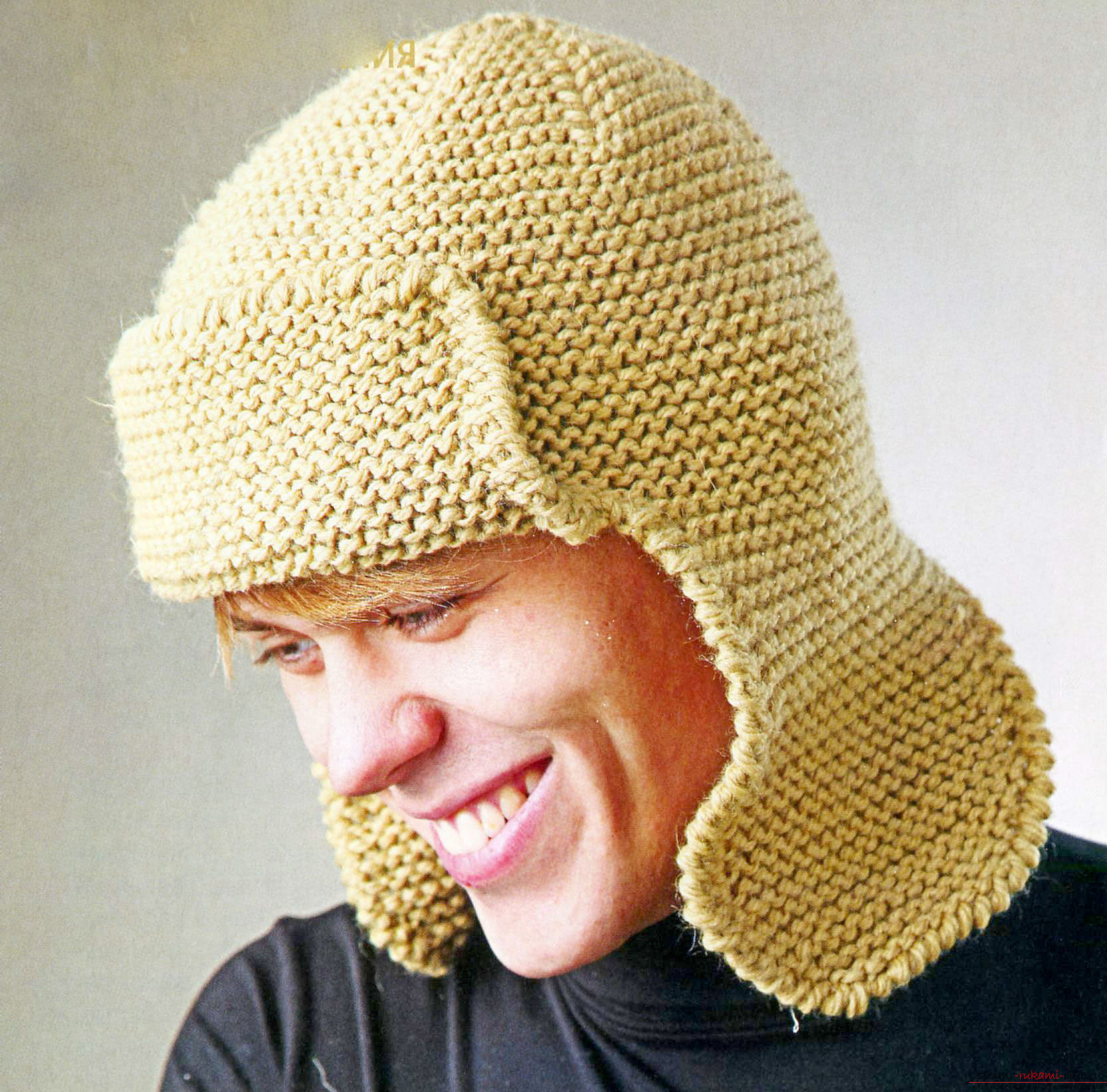 knitted with knitting needles and on the line a hat with ears. Photo №4