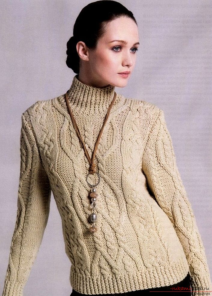 We knit a warm female sweater with knitting needles. Photo №1