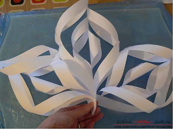 Volumetric snowflakes origami. Photo №6