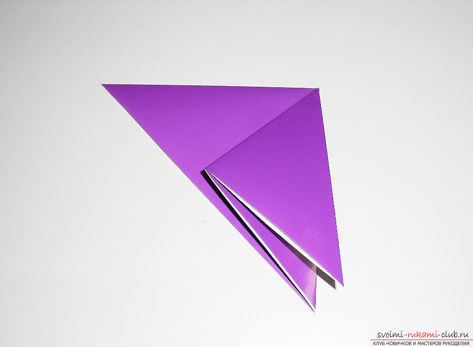 Crafting a swallow from paper in origami technique. Photo №4