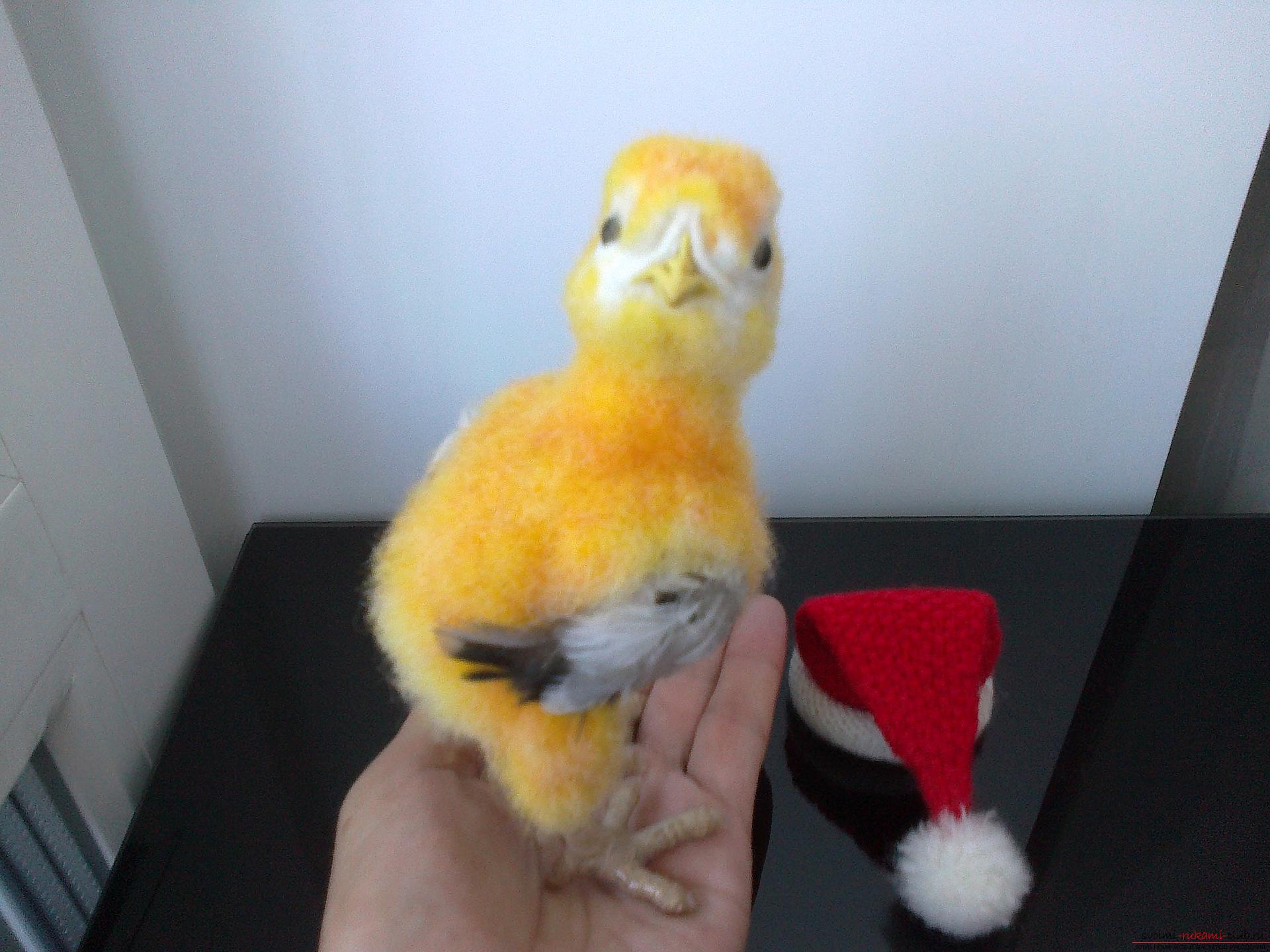 Description of the toy in the form of a chicken, made in the technique of dry felting. Photo №6