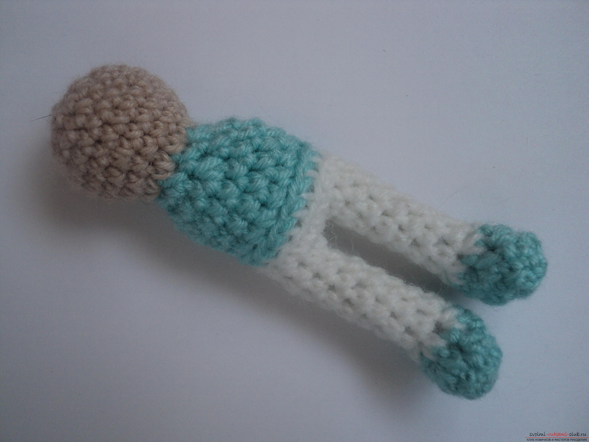 This detailed master class of crocheting toys will teach you how to tie a doll with your own hands .. Photo # 7