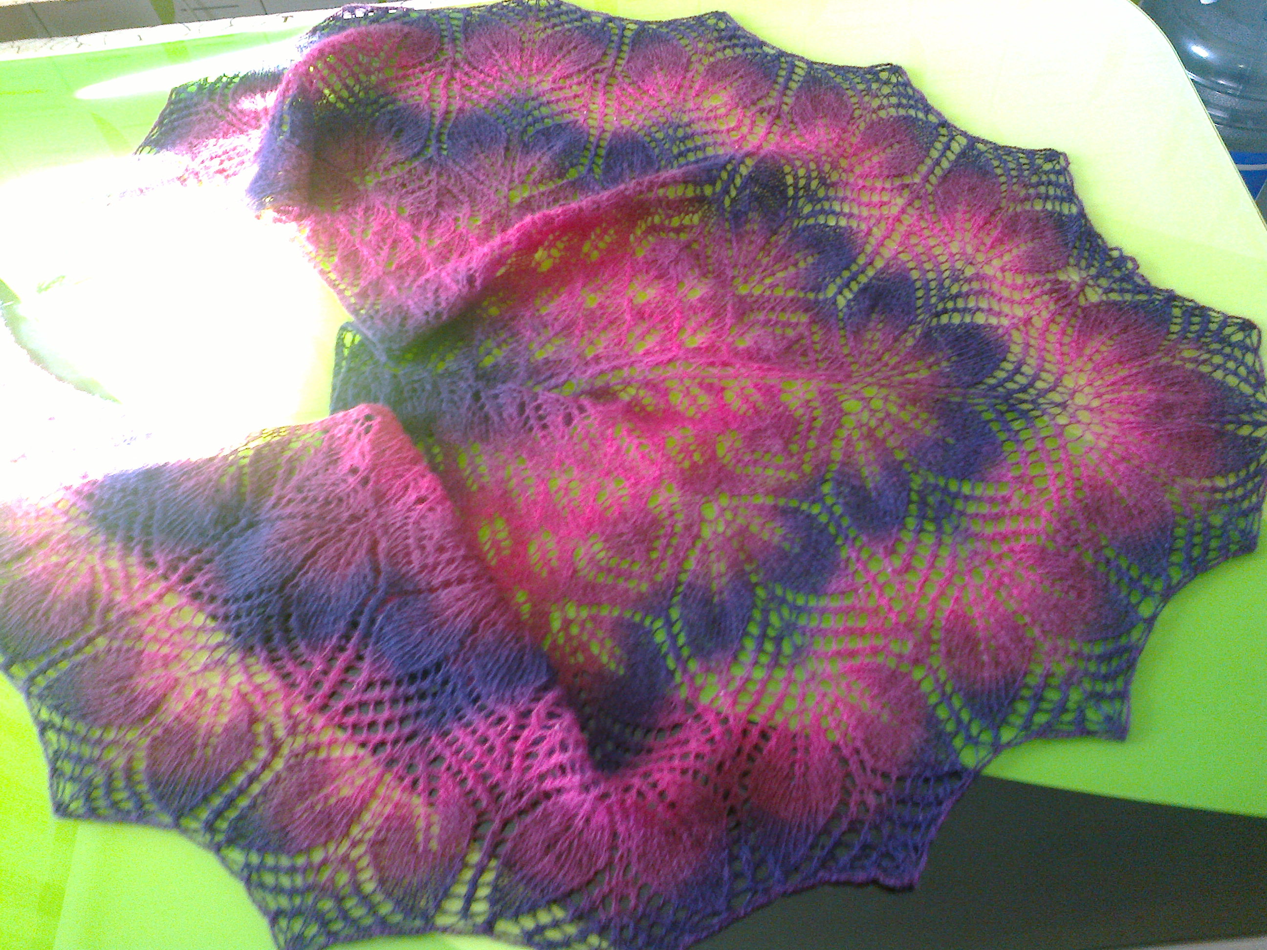 Shawl tied with knitting needles from woolen yarn. Photo # 2