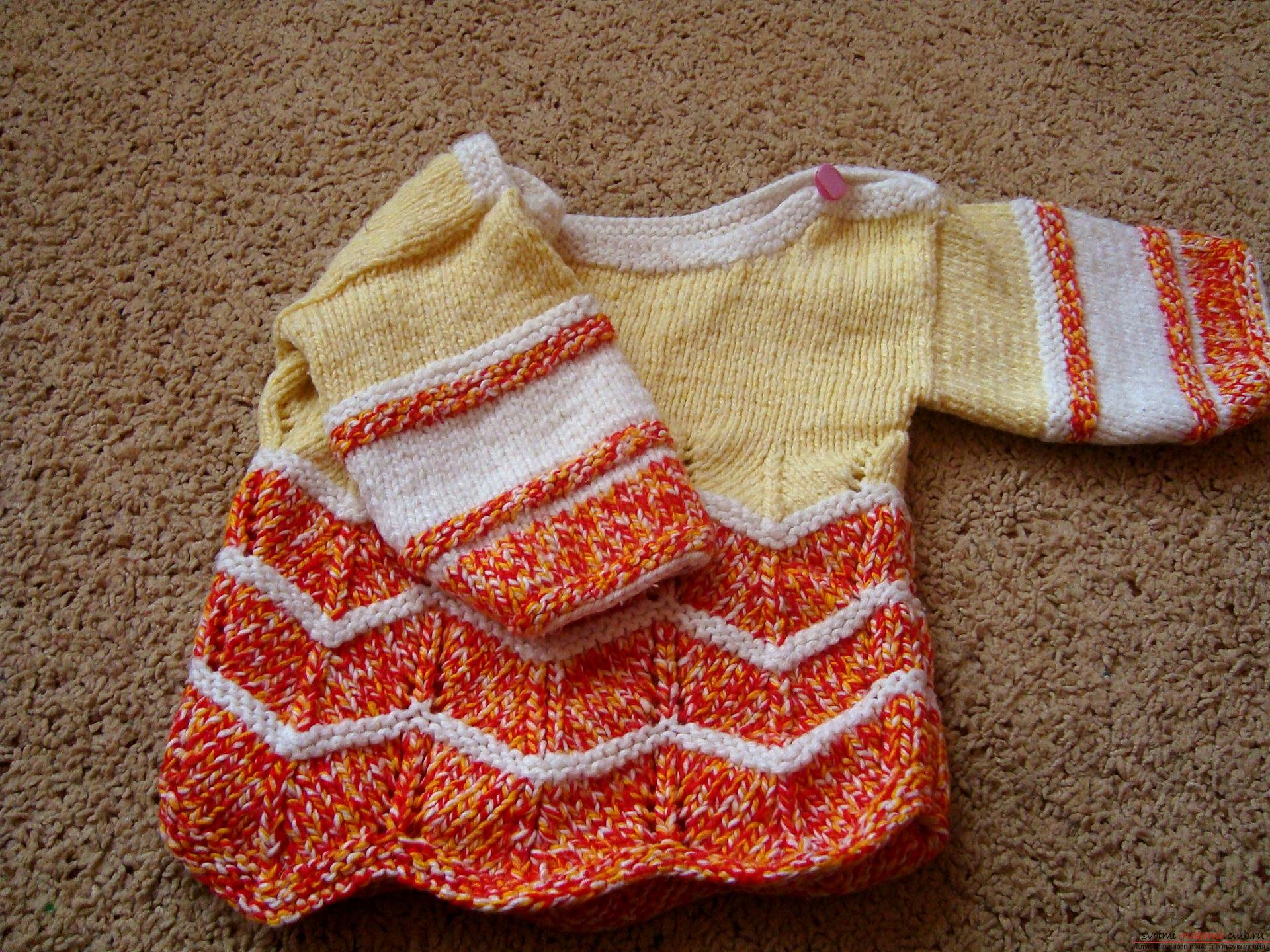 A master class with photo on knitting with needles will help to create a children's sweater that will warm in any weather. The use of bright yarn will make the thing unique and beautiful .. Photo # 2