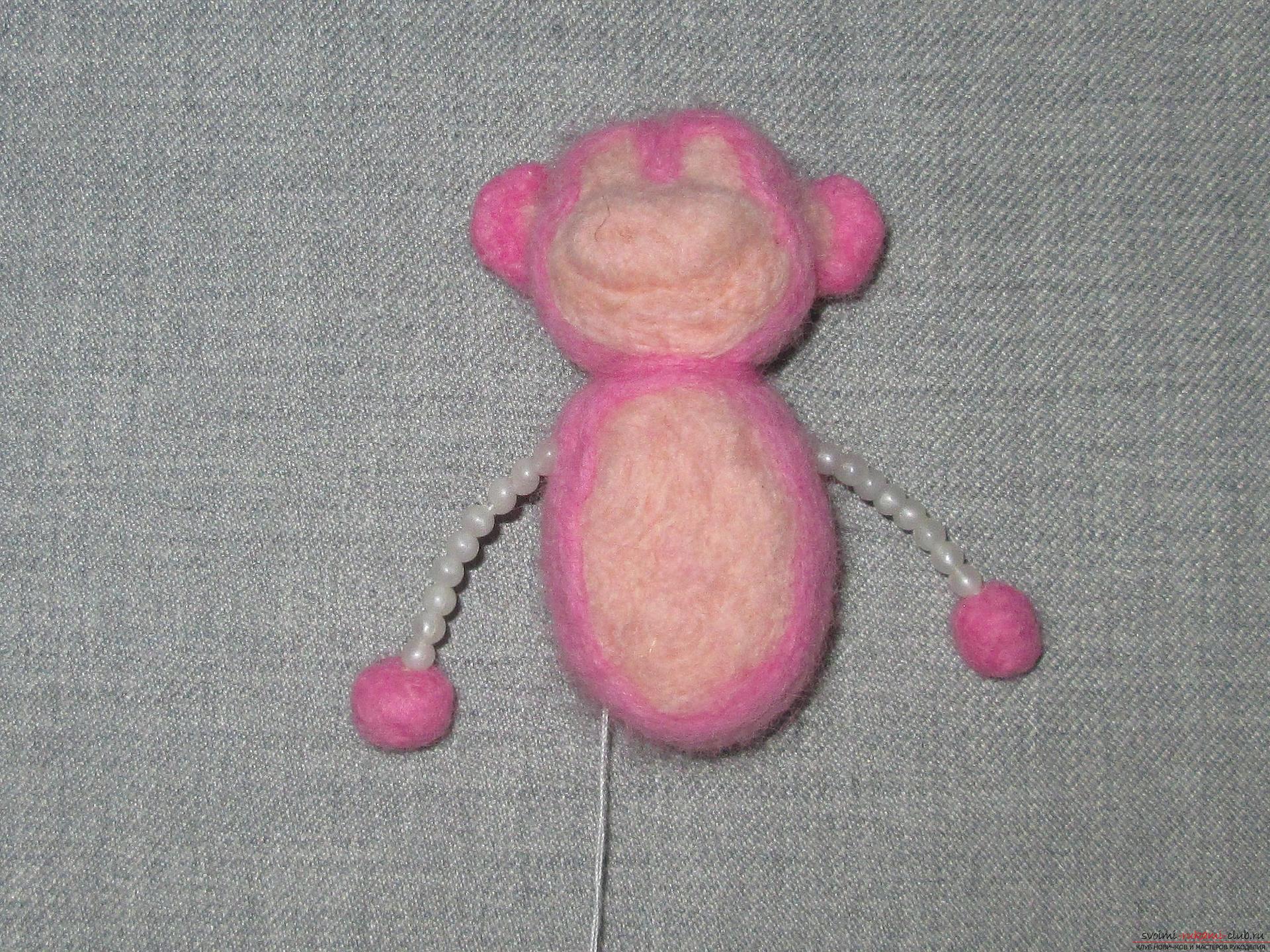 This master class felting out of wool will help make a toy monkey with your own hands. Photo Number 21