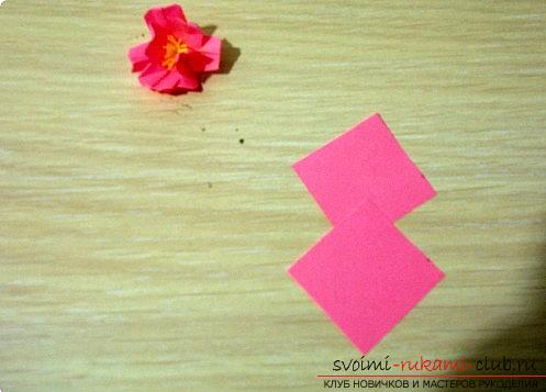 Sakura flowers in origami technique. Photo # 2