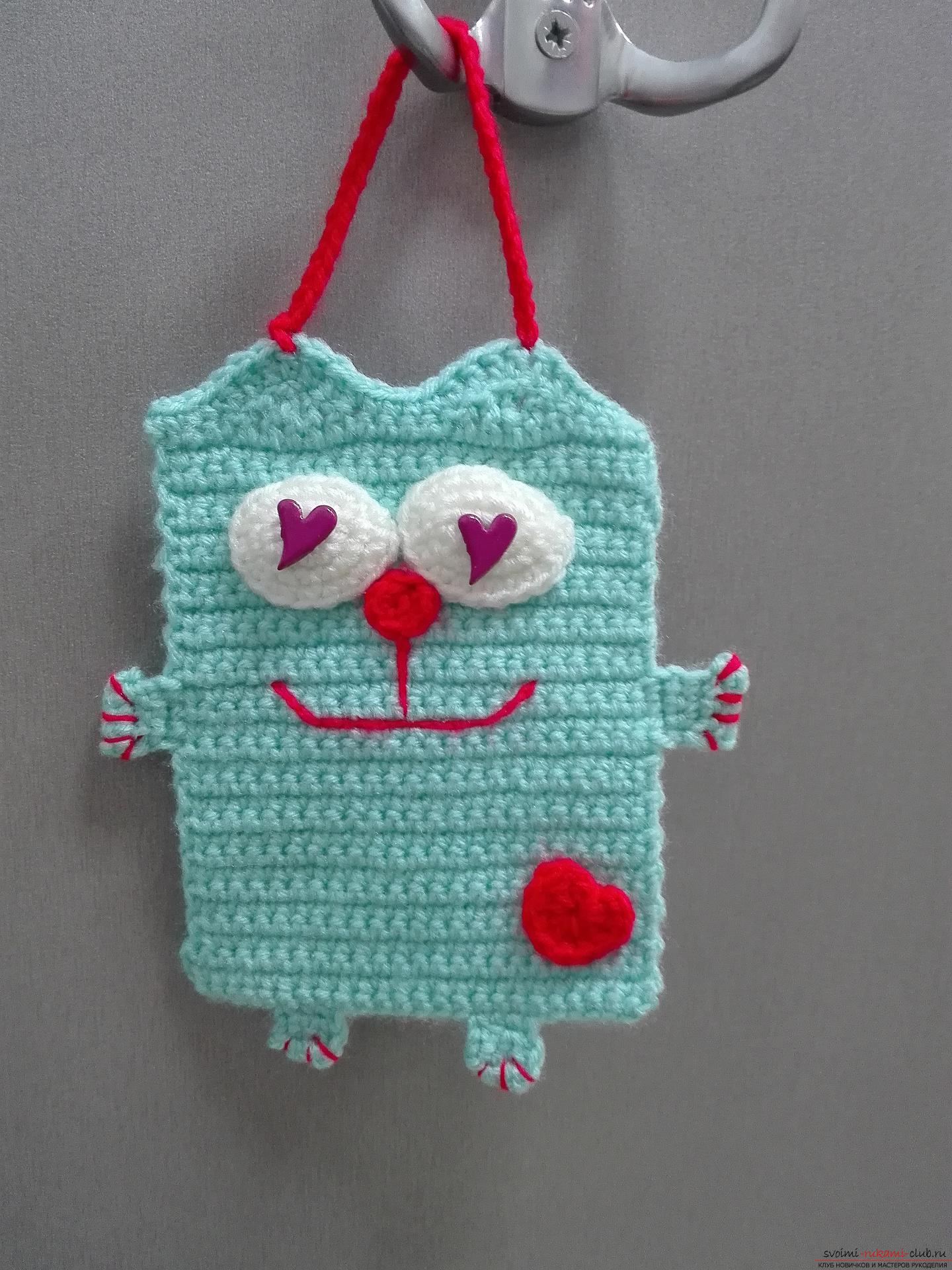 This master class will teach how to create a toy-pendant knitted cat. Photo №1