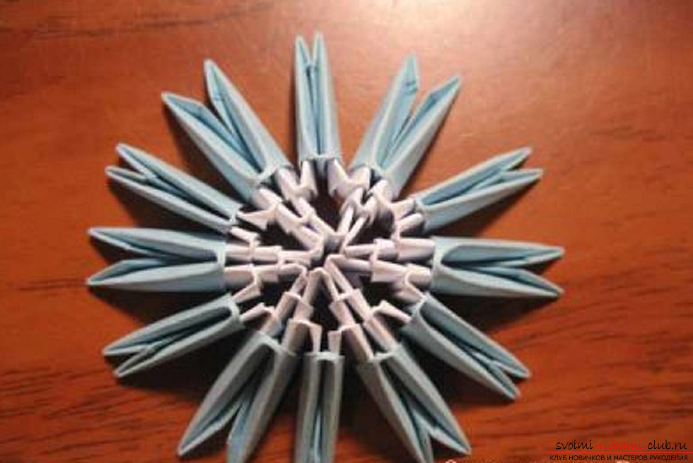 Modular origami snowflake. Photo number 15