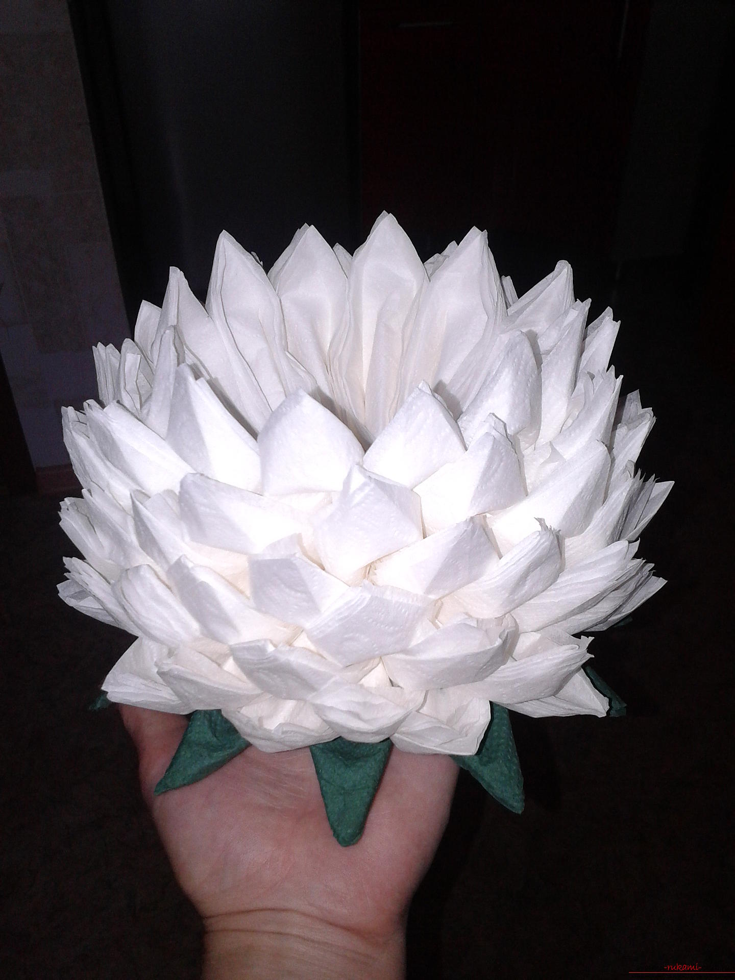 Amazing crafts made of napkins can make even children, the lotus flower is made from kitchen white napkins .. Photo # 1