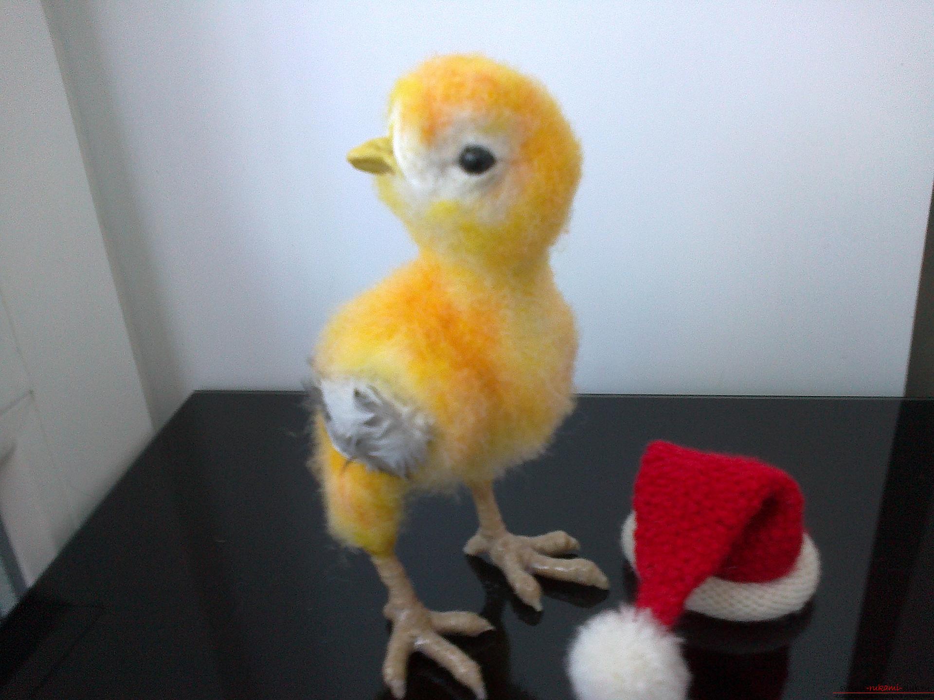Description of the toy in the form of a chicken, made in the technique of dry felting. Photo №4