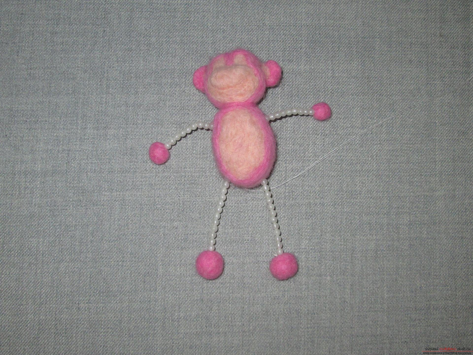 This master class felting out of wool will help make a toy monkey with your own hands. Photo Number 22