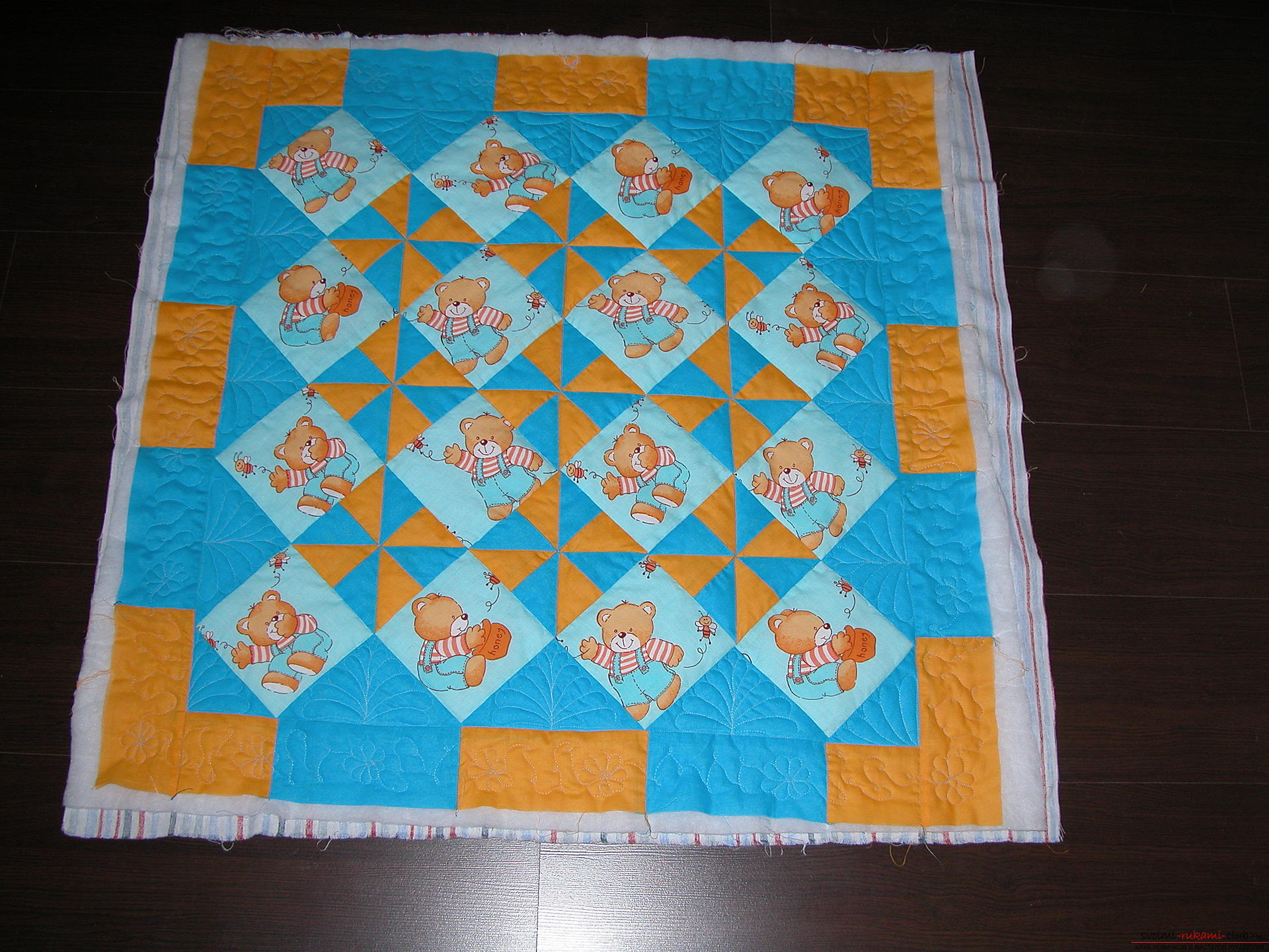 A detailed master class on sewing a children's quilt. Photo Number 19