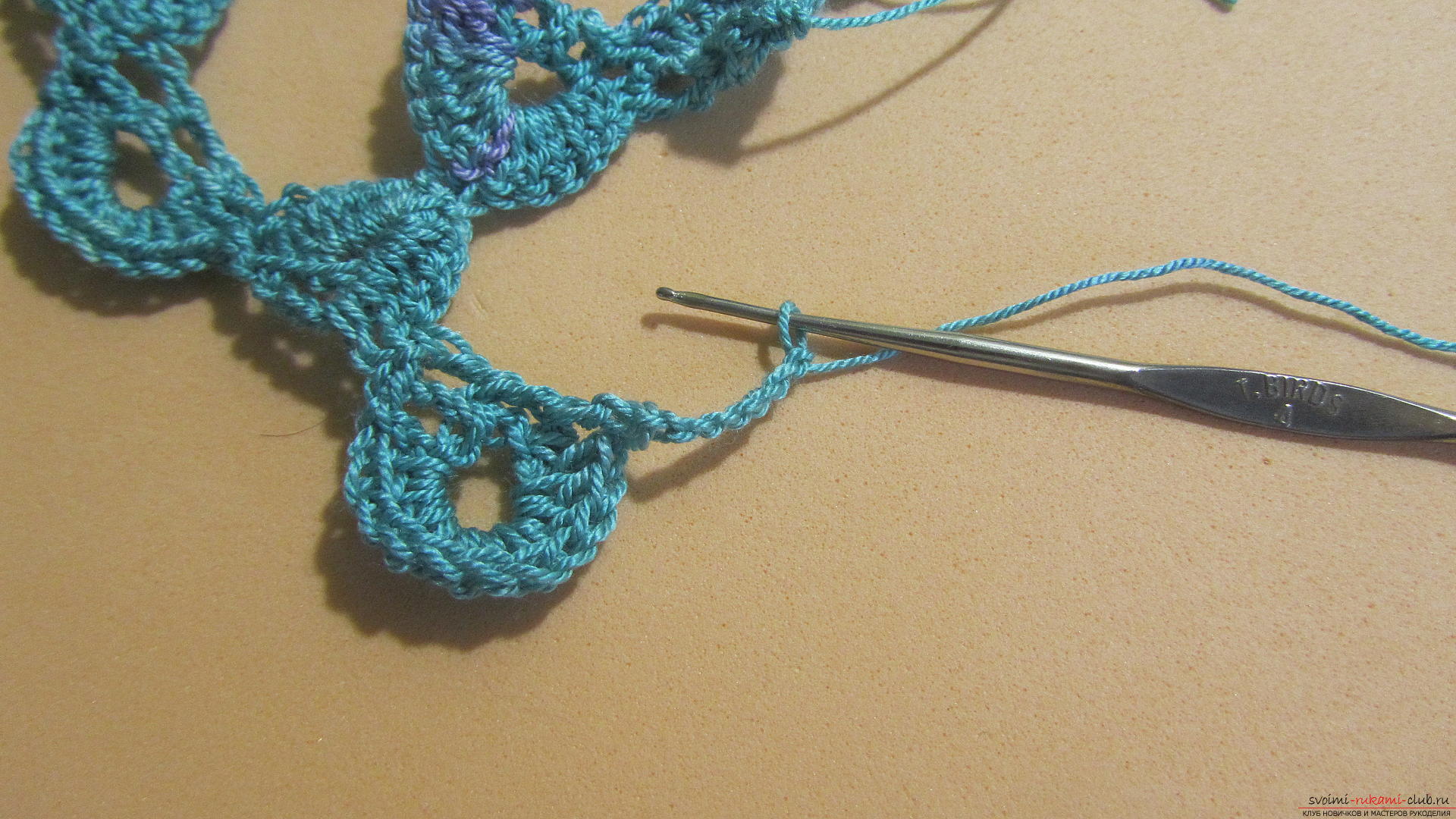 The master class will tell you in detail about crochet work on an openwork scarf. Picture №31