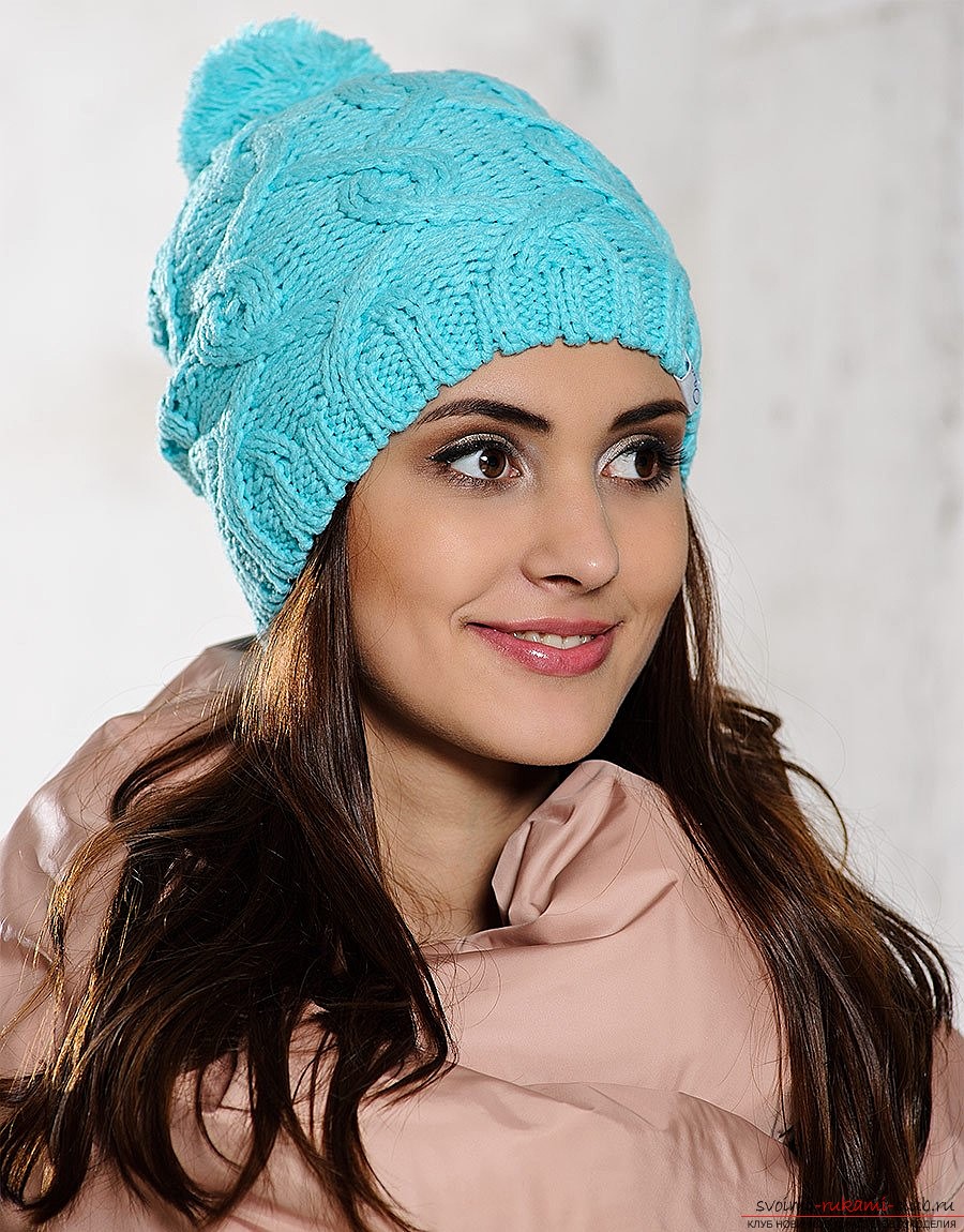 a knitted woman's knitted hat with a braid pattern. Photo №1