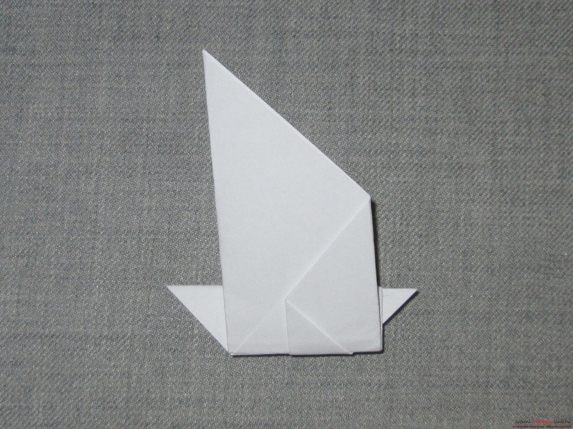 This detailed workshop of origami for children of 8 years will teach how to make origami-pigeons from paper .. Photo # 7