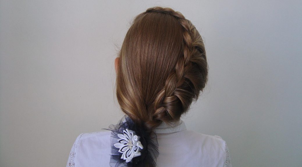 Beautiful hairstyle with a scythe in school