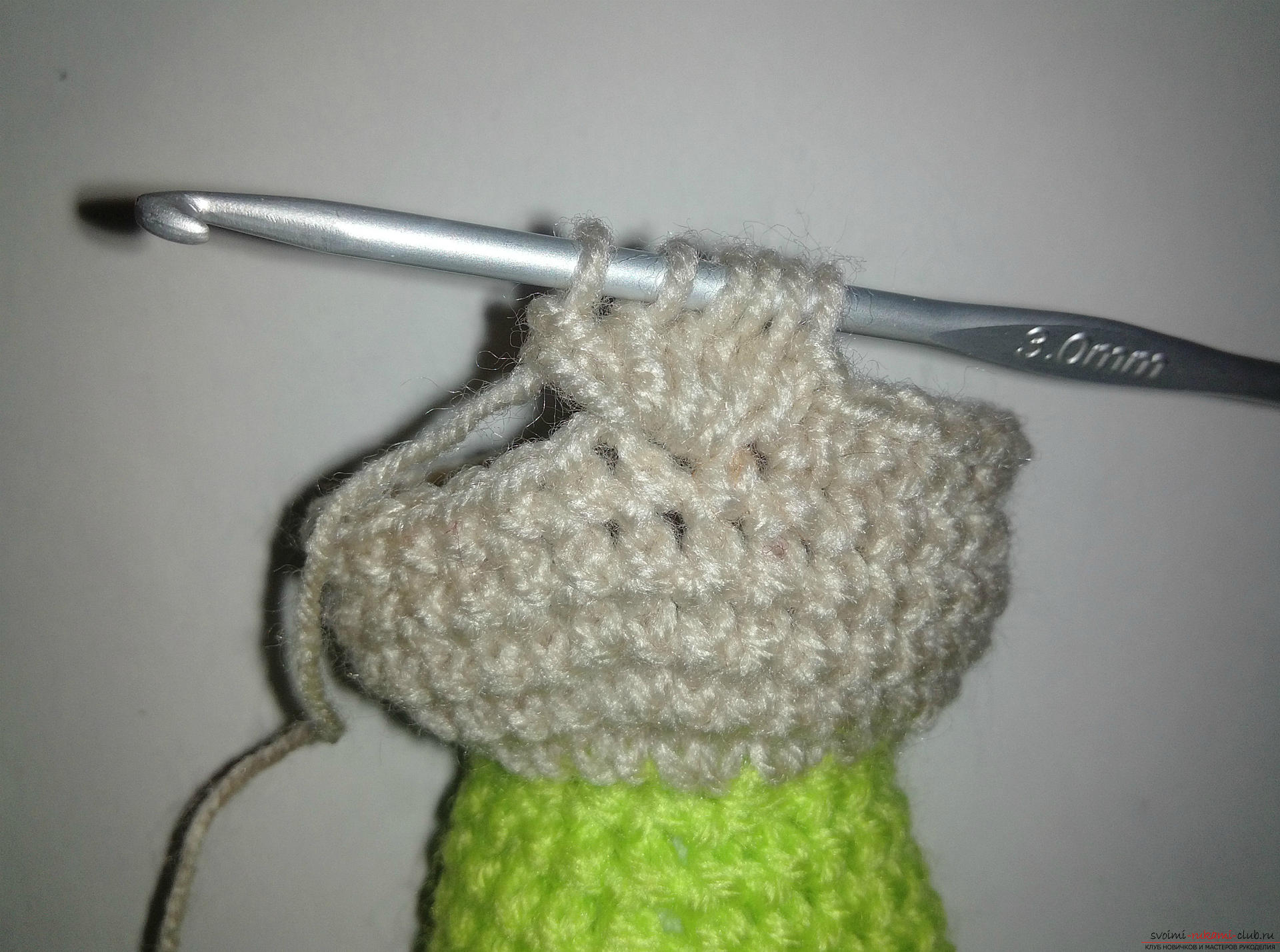 A master class with a photo and description will teach you how to tie a crocheted dwarf toy. Photo №7