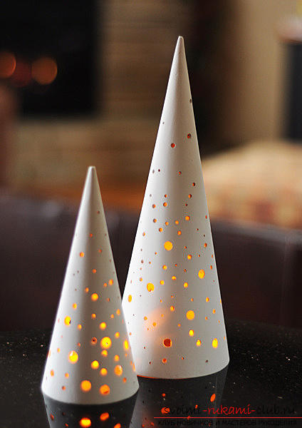 Beautiful crafts made of cones and paper to a child in school. Photo №4