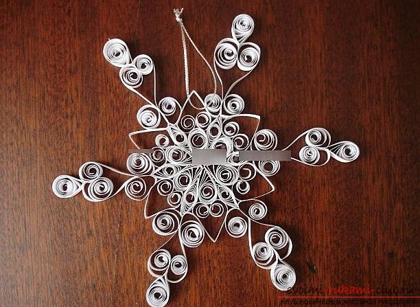 Quilling of a new shape of a snowflake with your own hands is a quilling technique for a snowflake. Photo №7