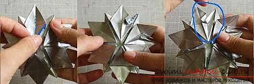 A three-dimensional snowflake made in origami technique. Photo Number 9