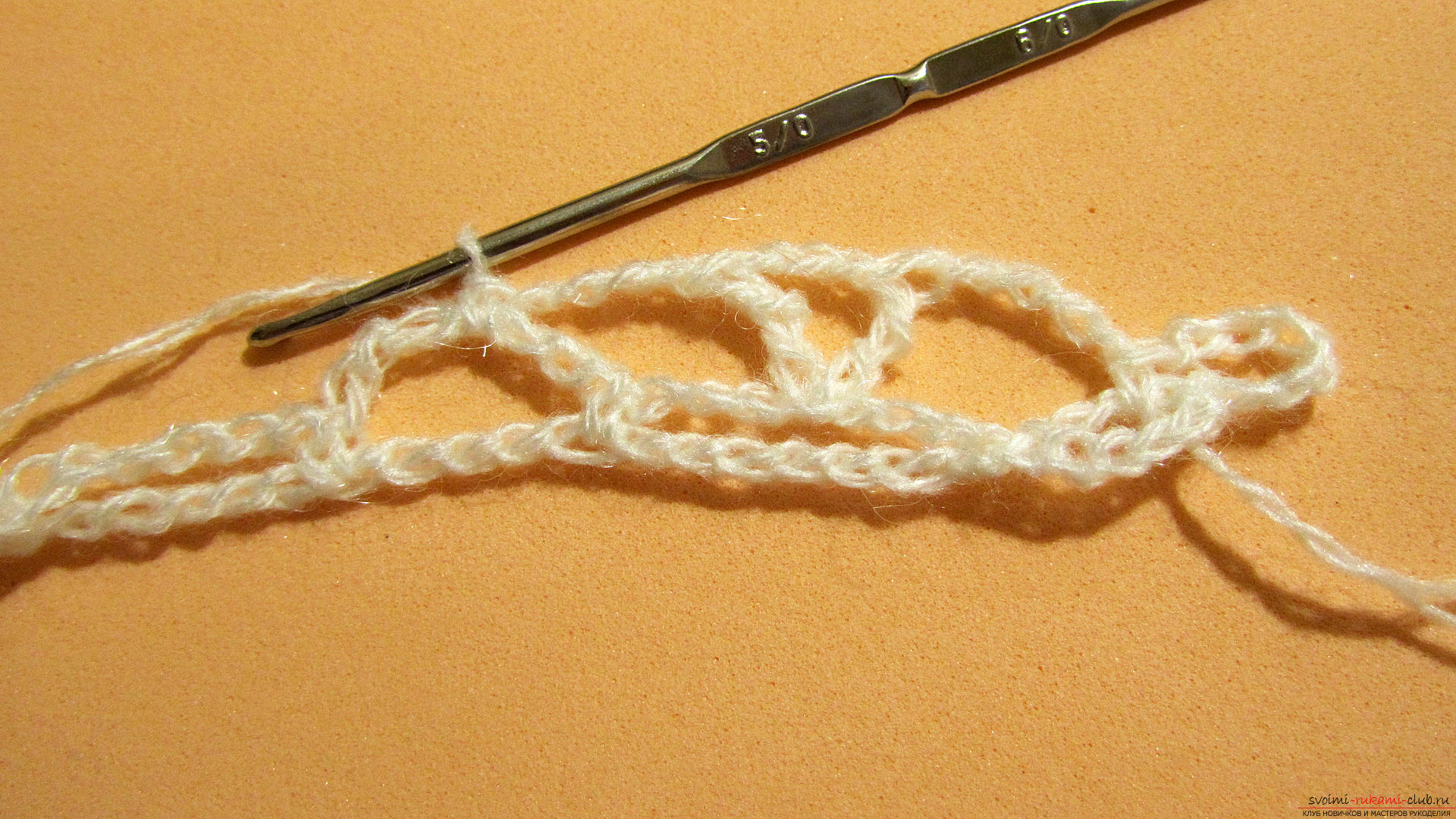 The master class is dedicated to knitting a beautiful stitch with a crochet. Photo Number 11