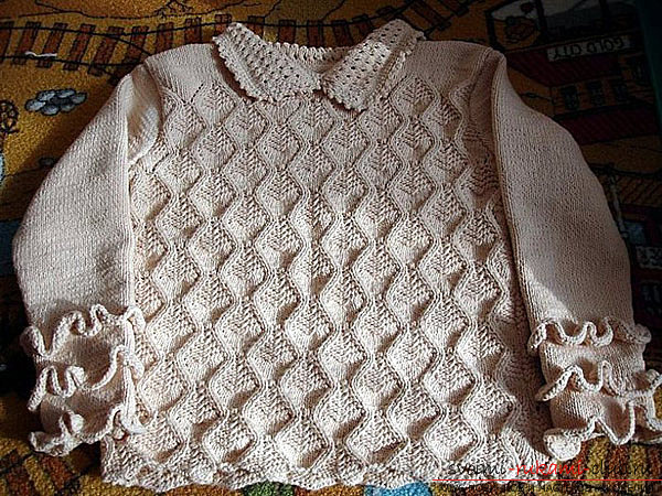 knitted on the knitting needles of a woman's openwork jacket with ruches. Photo №1