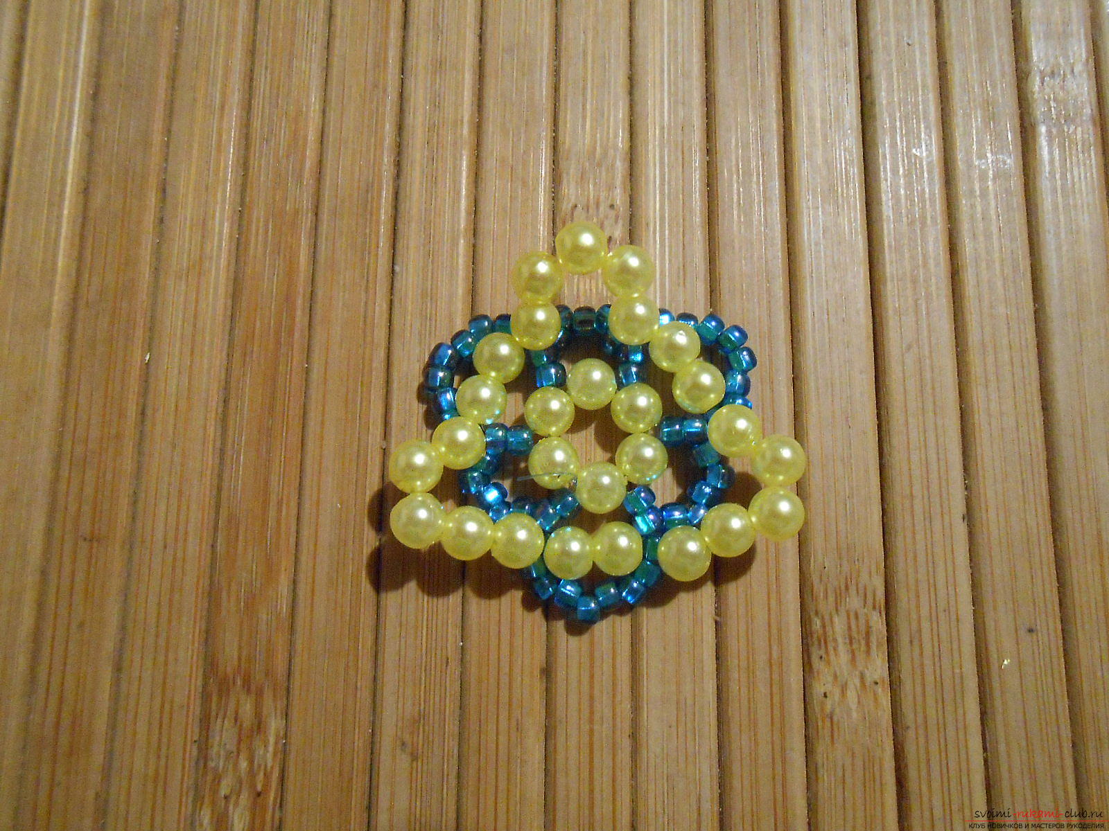 This master class of weaving from beads will tell you how to weave the earrings yourself .. Photo №18