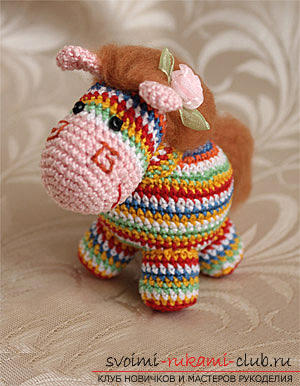 A lesson on knitting an amigurumi crochet with description and photo. Photo Number 14